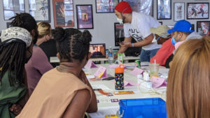 Artistic Director Megan Carney joins via Zoom to kick off rehearsals for the cast and crew of The Magnolia Ballet and About Face Theatre. Photo by Charles Riffenburg.