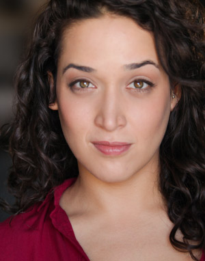 headshot: Aila Ayilam Peck